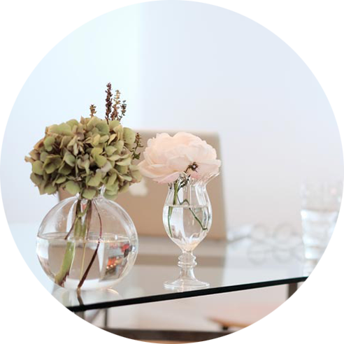 Flowers on table in glass vase interior design North Shore Auckland